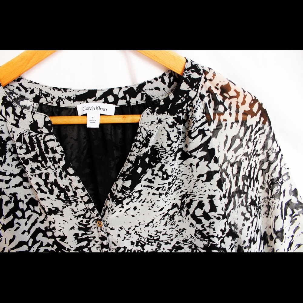 Calvin Klein • Shear Blouse • Black and white